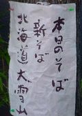 {̌